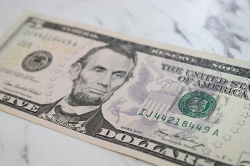 Single Five Dollar Bill, Close-Up of US Currency, Financial Concept