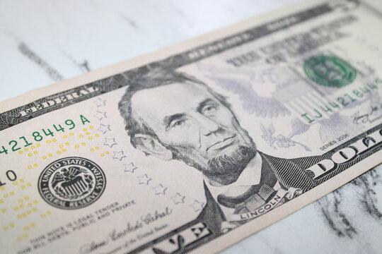 Single Five Dollar Bill, Close-Up of US Currency, Financial Concept