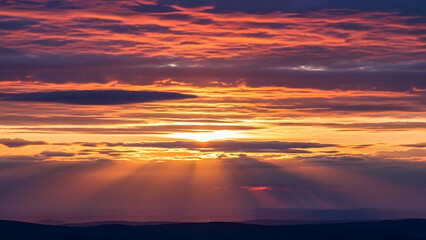 Dramatic Sunset Clouds with Vibrant Orange, Pink and Purple Sky in Cinematic Evening Light