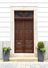 Ornate double wooden door inviting home entrance
