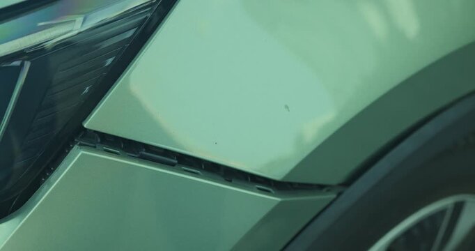 Close-up of car damage after a traffic collision, illustrating the auto insurance claim process, vehicle insurance coverage, accident repair, and motor insurance protection concept