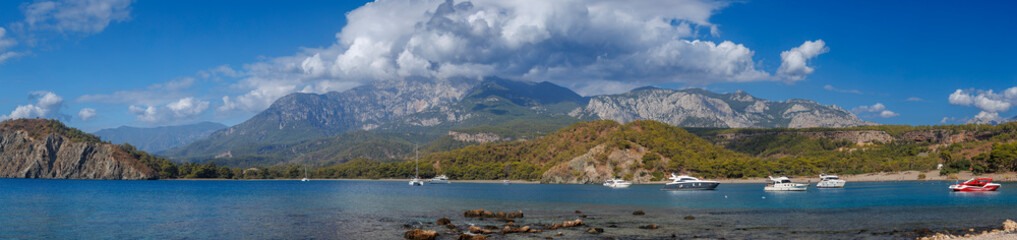 Scenic mountains, pine forests, sandy beaches, turquoise sea, bays, coves, Taurus Mountains views, Mediterranean coastline, nature reserve, ecological park, Wild beaches, gray sand shore