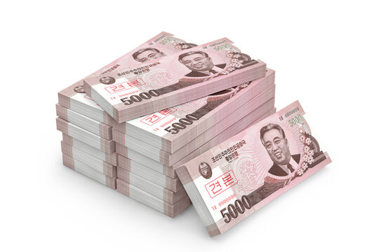 Stack of North Korean Five Thousand won Banknotes on a white background