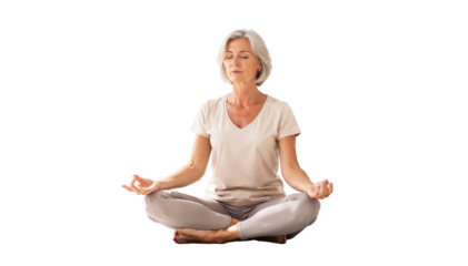 Focused woman seated in a bright yoga studio eyes shut and breath controlled demonstrating therapeutic breathing techniques to soothe hot flashes in a calming health space.