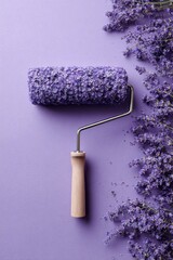 Obraz premium Creative lavender paint roller concept with real flowers on purple background