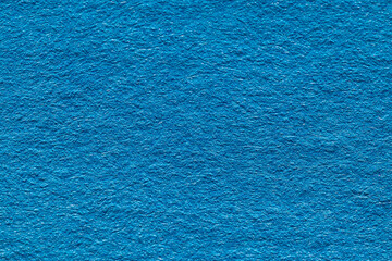 ざらざらした青色の壁