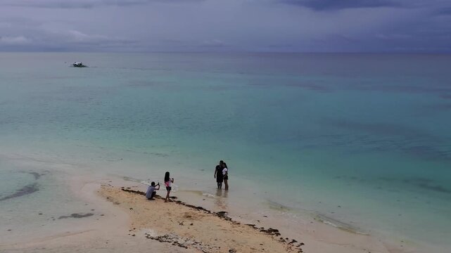 Sandbar in shallow tropical sea near island coast, Philippines, 2019