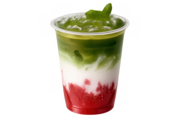 Iced green matcha latte layering milk and strawberry puree in a plastic cup with mint, transparent background
