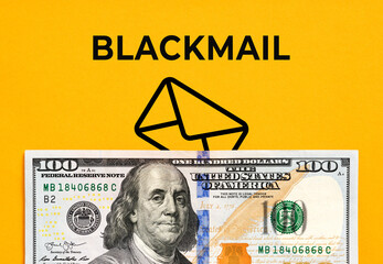 Blackmail concept with money and threatening message