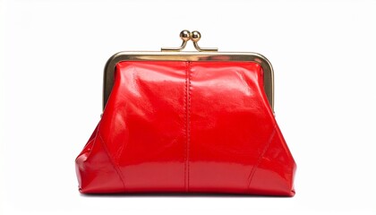 A glossy red handbag with gold hardware and turn-lock closure sits open on a dark surface—evoking luxury, bold femininity, and the sculptural elegance of fashion as functional art.