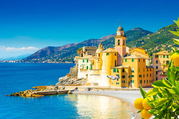Scenic Mediterranean riviera coast. Panoramic view of Camogli town in Liguria, Italy. Basilica of...