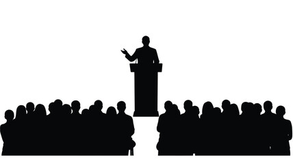 A speaker addressing a large audience a dramatic black silhouette