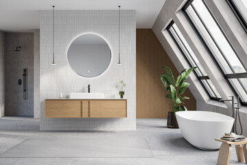 Modern bathroom interior with gray and white tiles wall, concrete floor, wooden vanity with black sink and oval mirror, white bathtub, shower, panoramic windows. 3d Rendering