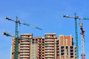 Construction industry.Large high rise crane, new building