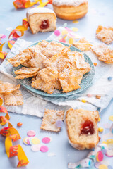 Carnival and party snack with confetti, ribbon and party accessories