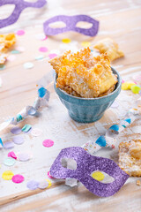 Carnival and party snack with confetti, ribbon and party accessories