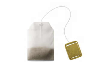 Teabag with string and blank label for hot beverage infusion, ready for making herbal or black tea drink