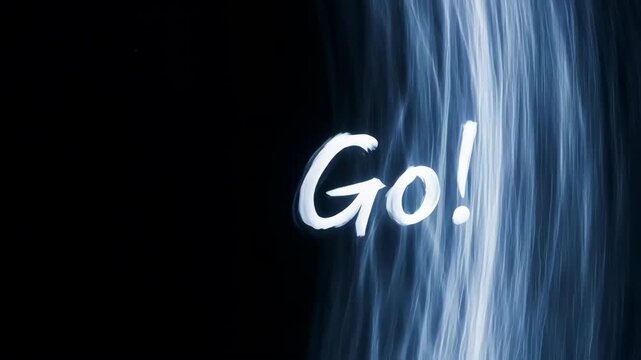 Go word written on a dark blue abstract background with motion blur effect.