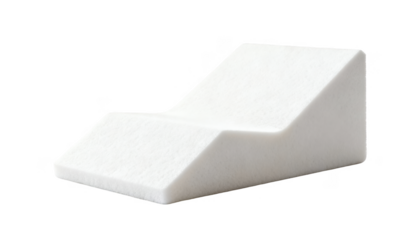 Contoured wedge pillow used for elevating the upper body in balance tests highlighting its texture and shape isolated on a white seamless background.