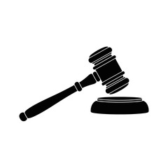 Silhouette of a Gavel and Sound Block Symbolizing Justice and Law.