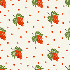 Seamless rowan branch pattern with red berries and green leaves. Natural botanical background for packaging, textiles, wallpapers, fabric, wrapping paper and seasonal design.