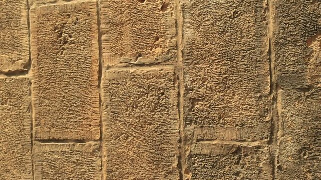 Old street wall plaster brown color texture horizontal video
