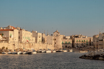 Scenic harbor view of Mediterranean town at sunset