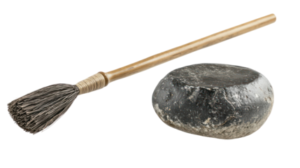 Curling stone and broom side by side top-down perspective isolated on transparent background