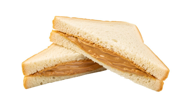 Two peanut butter sandwiches on white bread food snack