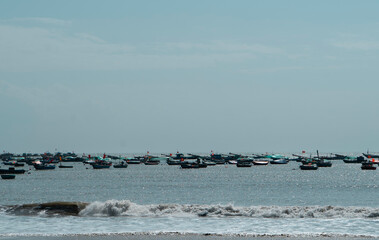 Local fishing industry, maritime transport and coastal lifestyle in Southeast Asia. No people, outdoor daytime scene.