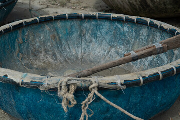  Traditional Vietnamese basket boats on sandy beach. High quality photo (coracle boats) Local fishing equipment and coastal lifestyle in Vietnam, Southeast Asia. No people, outdoor daytime scene. 