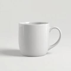 Fototapeta premium Classic White Ceramic Coffee Mug with Glossy Finish Isolated on Neutral Background for Branding Mockup and Product Design