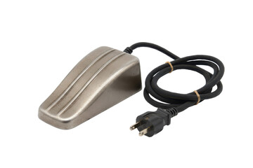 Fototapeta premium Industrial control foot pedal with power cable for electrical equipment on the surface