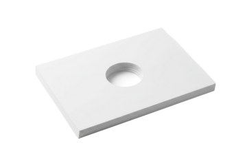 Minimalist composition of a stack of white papers with a circular cutout revealing depth and light