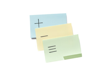 Minimalist composition with plus, minus, and equals symbols on pastel sticky notes