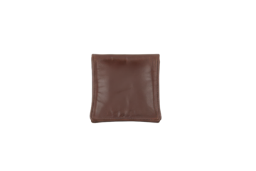 Minimalist leather wallet isolated on neutral surface with a soft, warm lighting setup