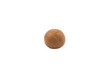 Minimalist single round textured pastry or bun in a soft earthy tone
