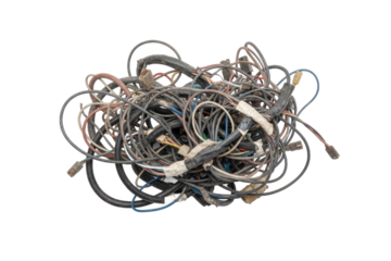 Tangled electronic wires and cables create a complex interwoven system of connectivity and function