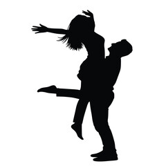 Silhouette of a joyful man lifting a delighted woman high into the air capturing a moment of pure romantic celebration.
