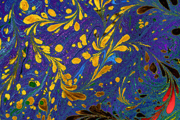 Vibrant psychedelic floral Ebru marbling art background with swirling liquid paint textures