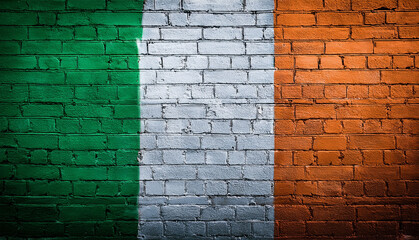 street art mural with irish flag colors painted on brick wall. ireland green white orange graffiti