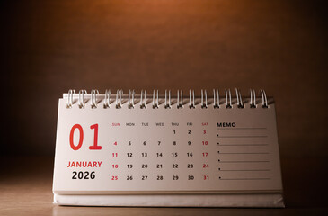 Calendar page of January 2026 on desk, with copy space. monthly planning concept, important schedules, meetings, and appointments.