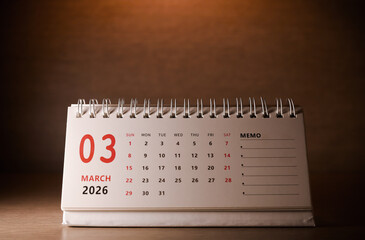 Calendar page of March 2026 on desk, with copy space. monthly planning concept, important schedules, meetings, and appointments.