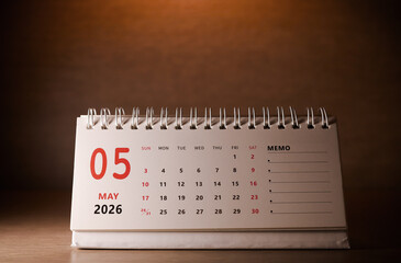 Calendar page of May 2026 on desk, with copy space. monthly planning concept, important schedules, meetings, and appointments.