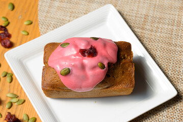 This is a raspberry loaf cake. It's made with high-quality wheat flour, fresh butter, and raspberries. It tastes delicious.