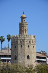 Torre del Oro, historical limestone Tower of Gold in Seville, a big tourist center in Spain