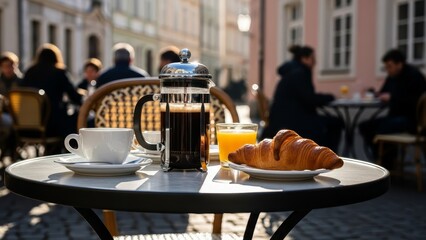 Coffee and Croissants on Outdoor Table.