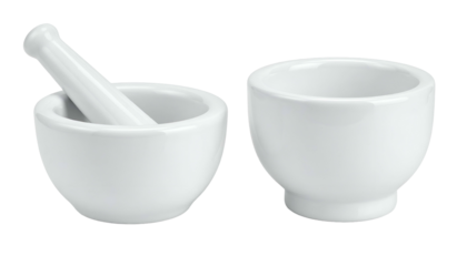 Two white ceramic mortars and pestles, one with pestle inside, against a black backdrop