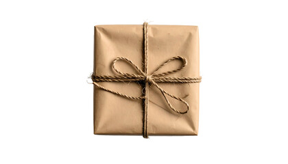 Overhead view of a square package wrapped in brown paper, tied with twine on a black background
