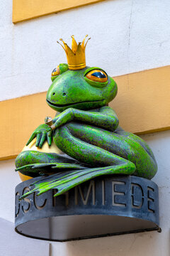 Bautzen, Germany, 20 August 2025 &ndash; Frog sculpture with golden crown above the entrance of Lange Lothar goldsmith in the old town